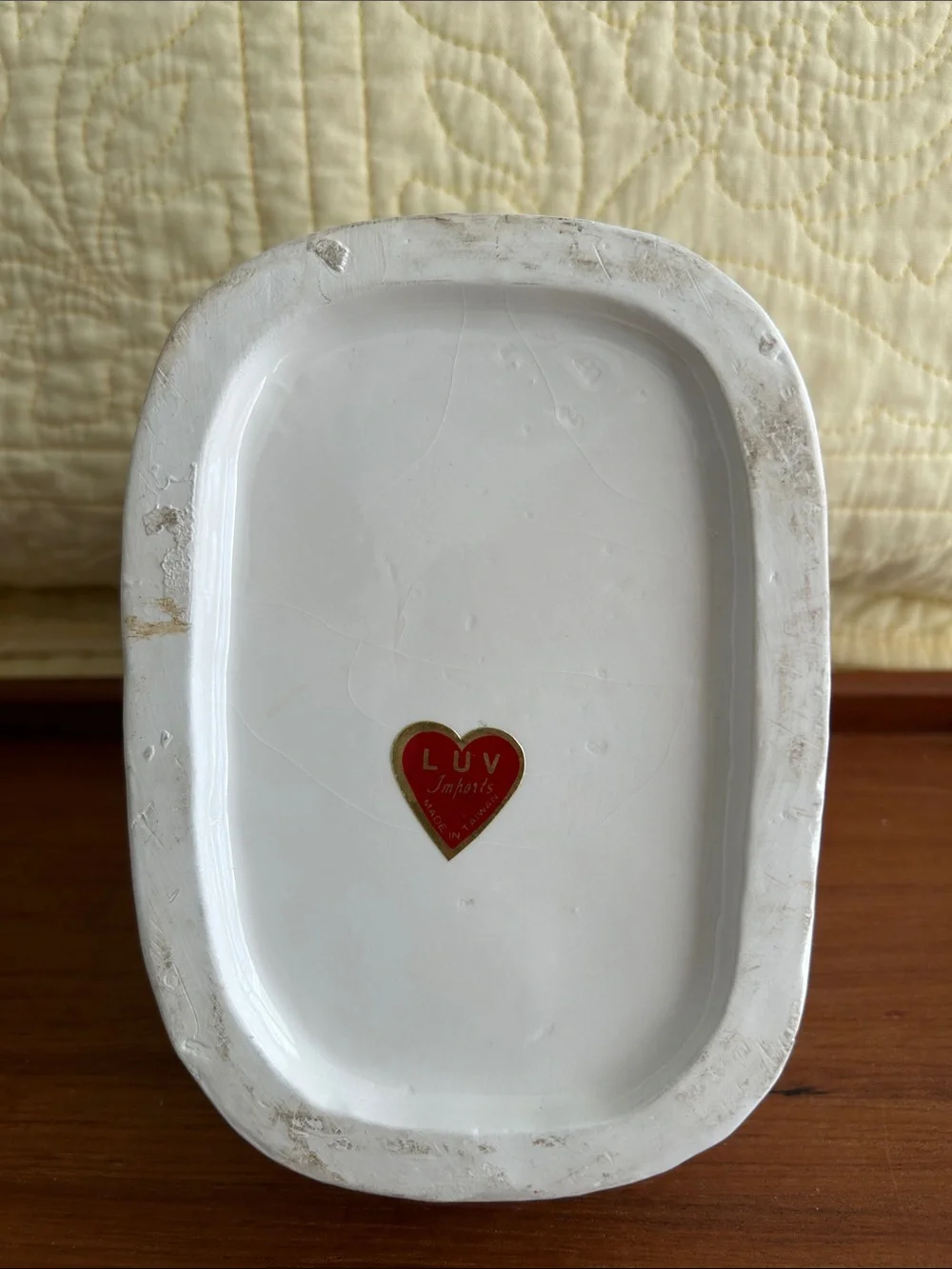 Vintage Ceramic baby bootie planter Embossed floral design and turquoise ribbon.